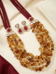 Red and yellow citrine wedding jewellery set with Kundan-inspired accents and matching earrings for sarees and lehengas.