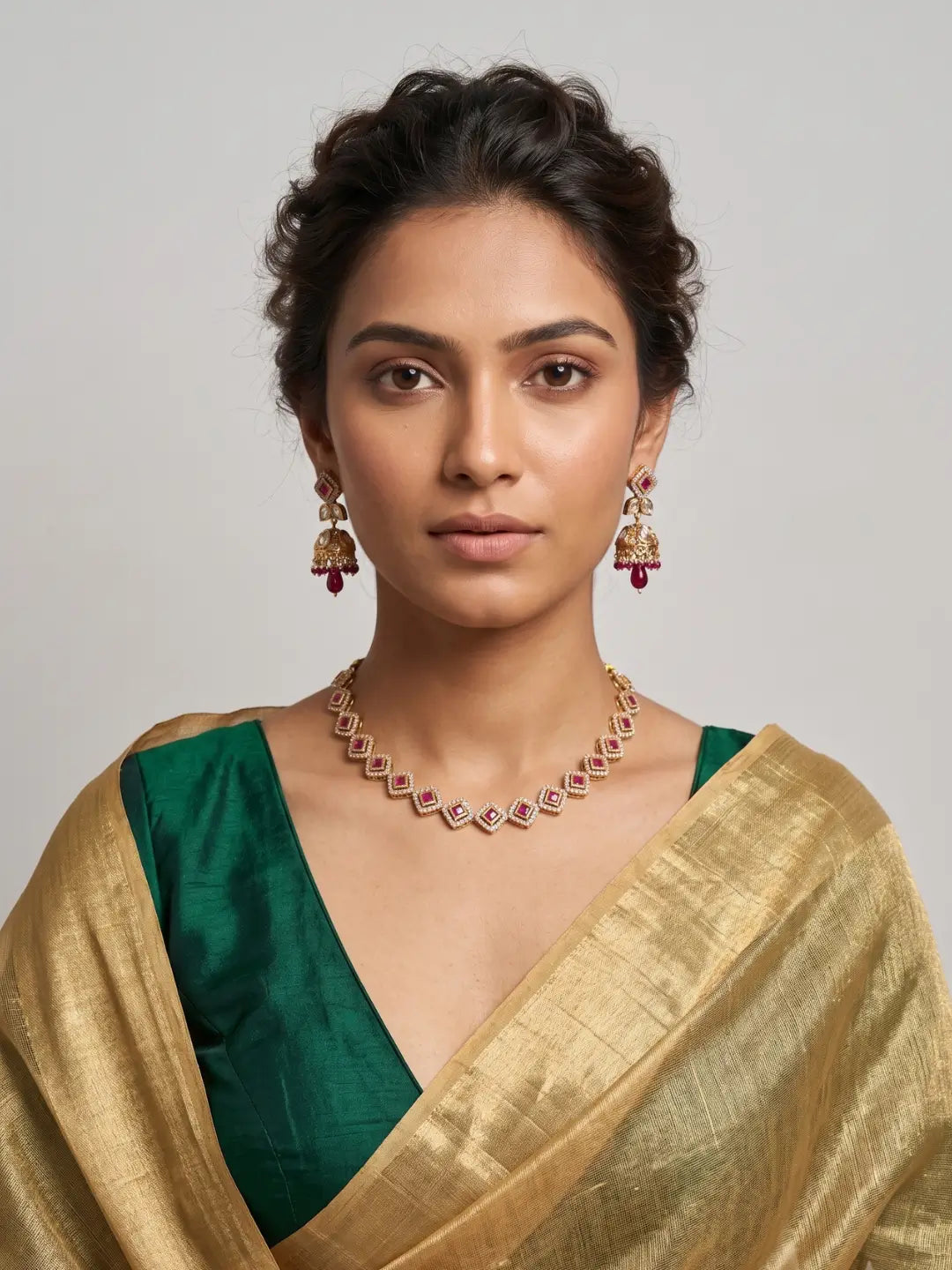 Ruby pink CZ and Polki stone necklace set with matching jhumka earrings for weddings, engagements, receptions and festive celebrations.