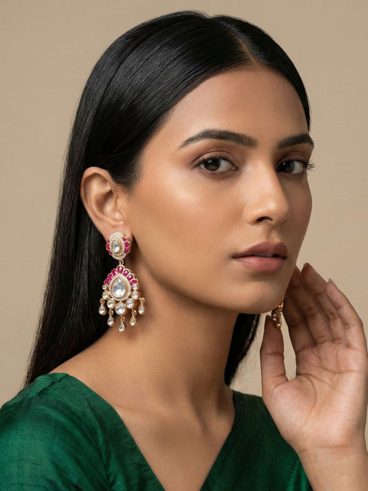 Ruby Pink gold plated Kundan earrings with a teardrop Polki centre, ruby scalloped detailing and multiple delicate drops for bridal outfits.