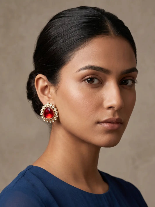 Ruby pink oversized polki kundan studs with teardrop colour stone, round polki halo and gold plated ethnic detailing