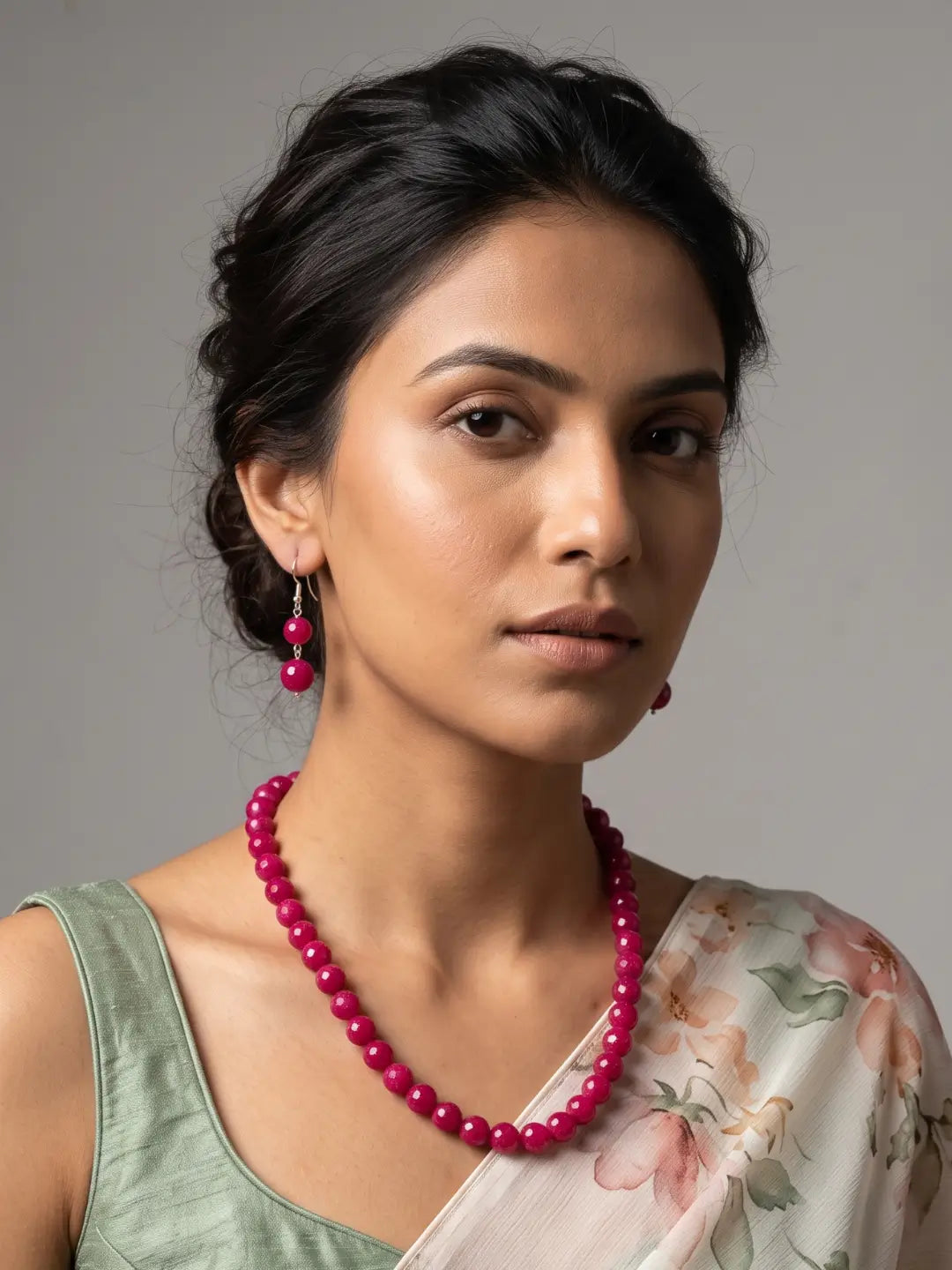 Matching cherry-red bead drop earrings with silver-tone accents, designed to coordinate with the single-strand necklace