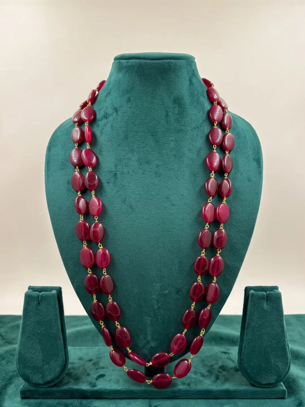 - Red jade bead necklace for groom with two graduated strands and an adjustable dori, suited to sherwanis, kurta sets and traditional Indian outfits.