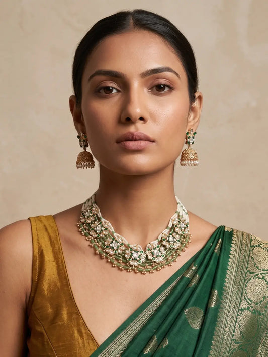 Traditional green heritage necklace featuring jade beads, faux pearls, Kundan accents, floral motifs and delicate hanging details