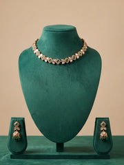 Traditional green Kundan and Polki necklace set with matching Jhumka earrings for weddings, festivals and party wear