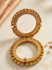 Traditional Kundan Pacheli bangles with pearl detailing, individual Kundan-style stones and green Meenakari accents for wedding styling.