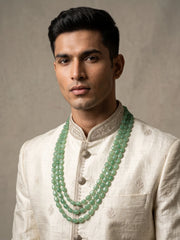 Triple layer mint green groom necklace with repeating polished jade beads, subtle gold-tone details and an adjustable dori fit.