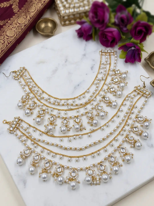 Traditional layered Kaan Chain with gold plated Kundan accents, white shell pearls and cascading chains for bridal bun styling