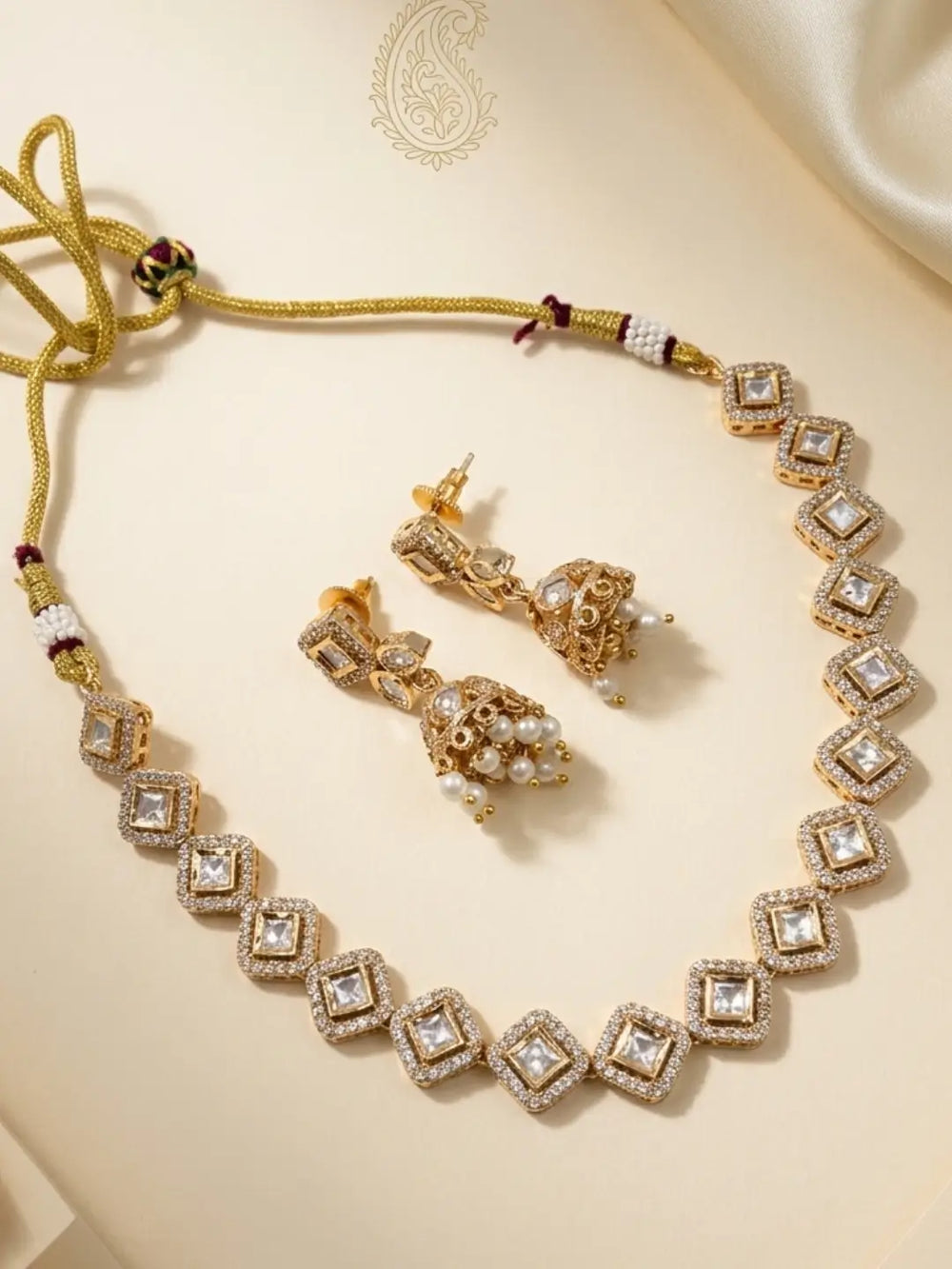 White CZ and Polki necklace set with matching jhumka earrings, designed for sarees, lehengas and traditional Indian outfits.
