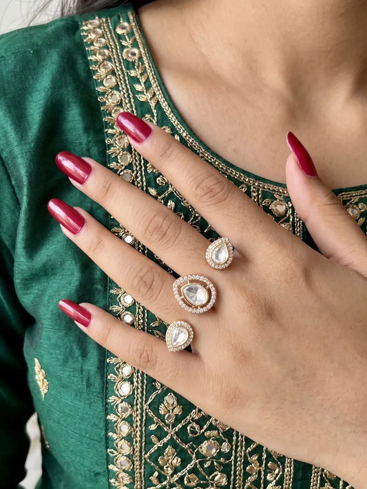 White gold plated Kundan Polki dual finger ring with pear-shaped CZ details, styled for bridal, wedding and festive jewellery occasions.
