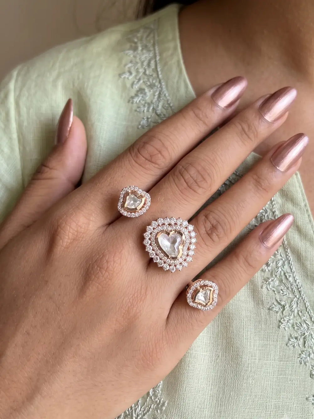 White Polki dual finger ring with two gold-tone bands, Kundan stonework and sparkling CZ details, designed for bridal and traditional wedding looks