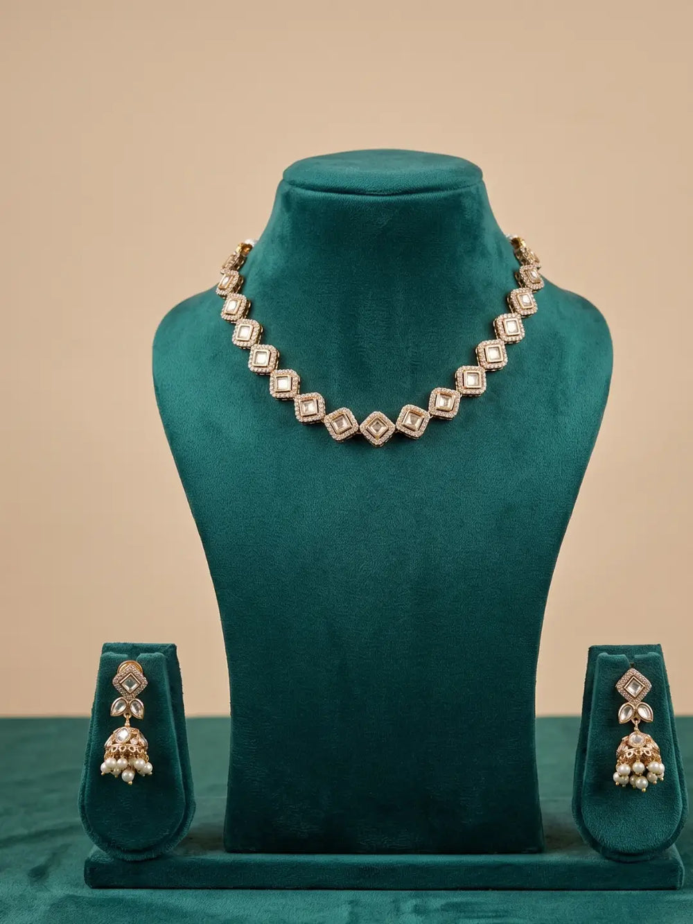 White Polki and Kundan-style choker necklace featuring CZ stones with matching jhumka earrings for Indian wedding and festive wear.