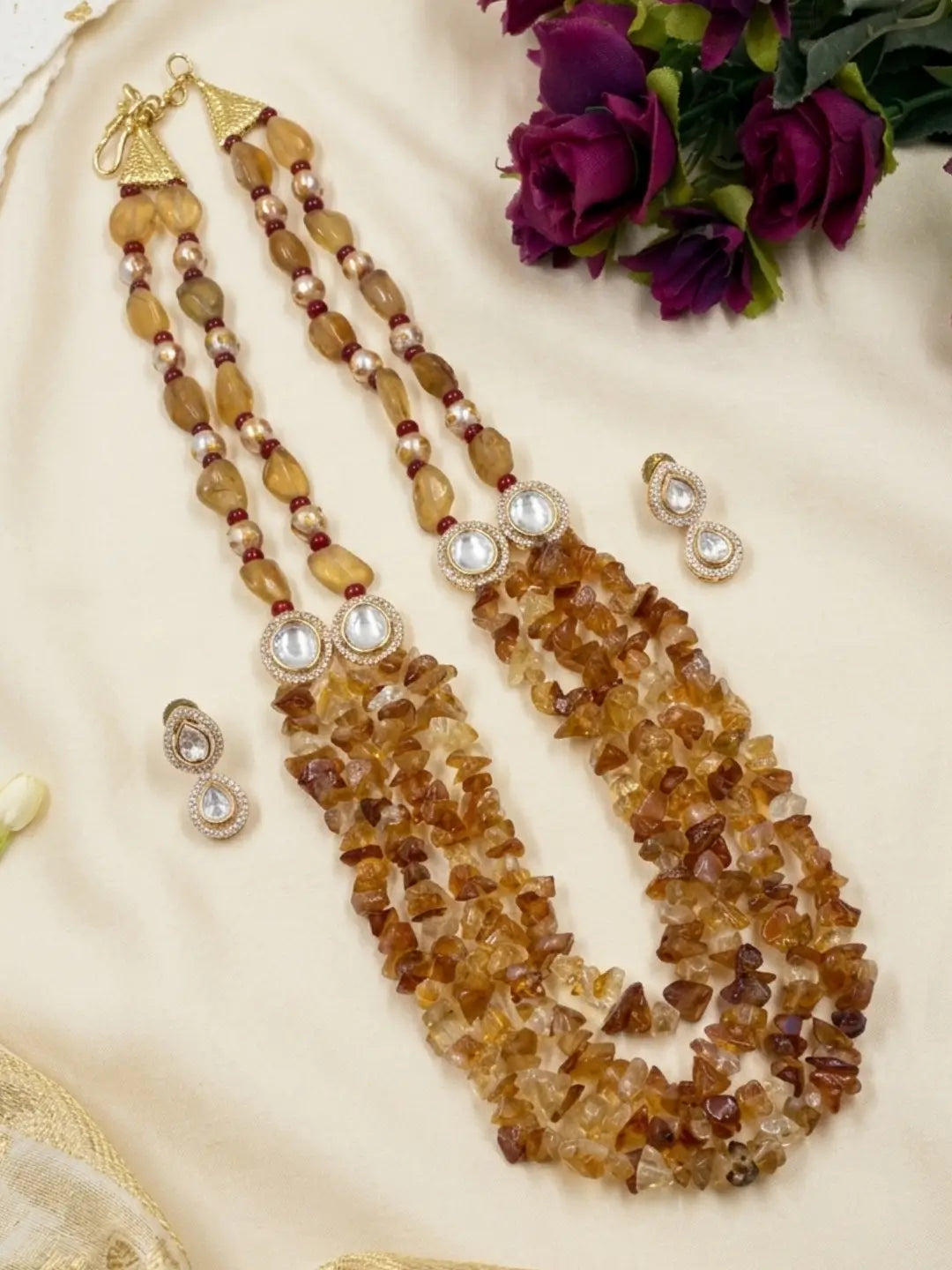 Yellow citrine gemstone jewellery set with red jade, Tanjore-painted pearls and matching earrings for sarees, lehengas and festive looks.