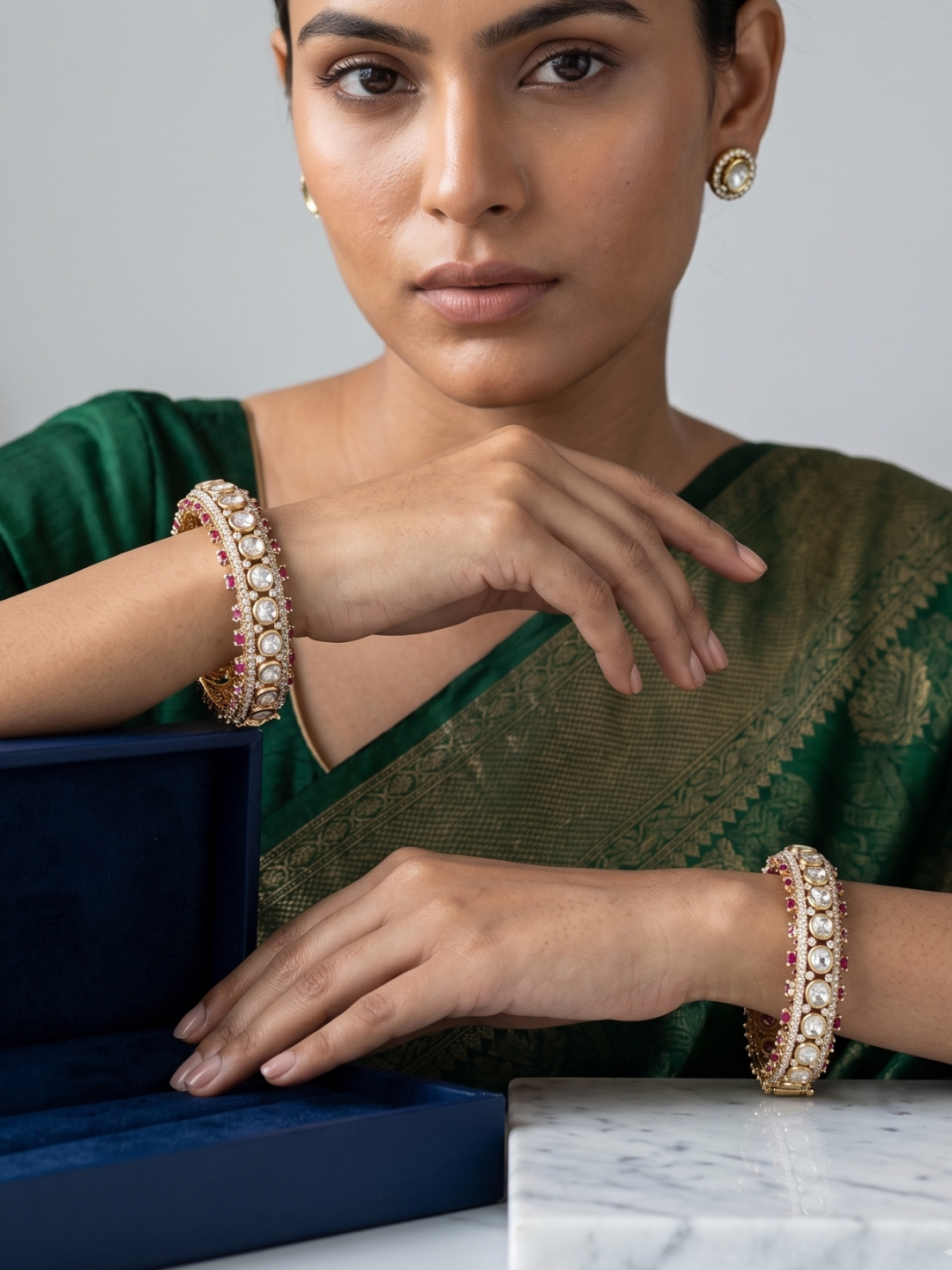 a women is wearing a Designer Antique Victorian Polki Kundan Kada Bangles With Ruby Stones | Wedding & Bridal Bangles