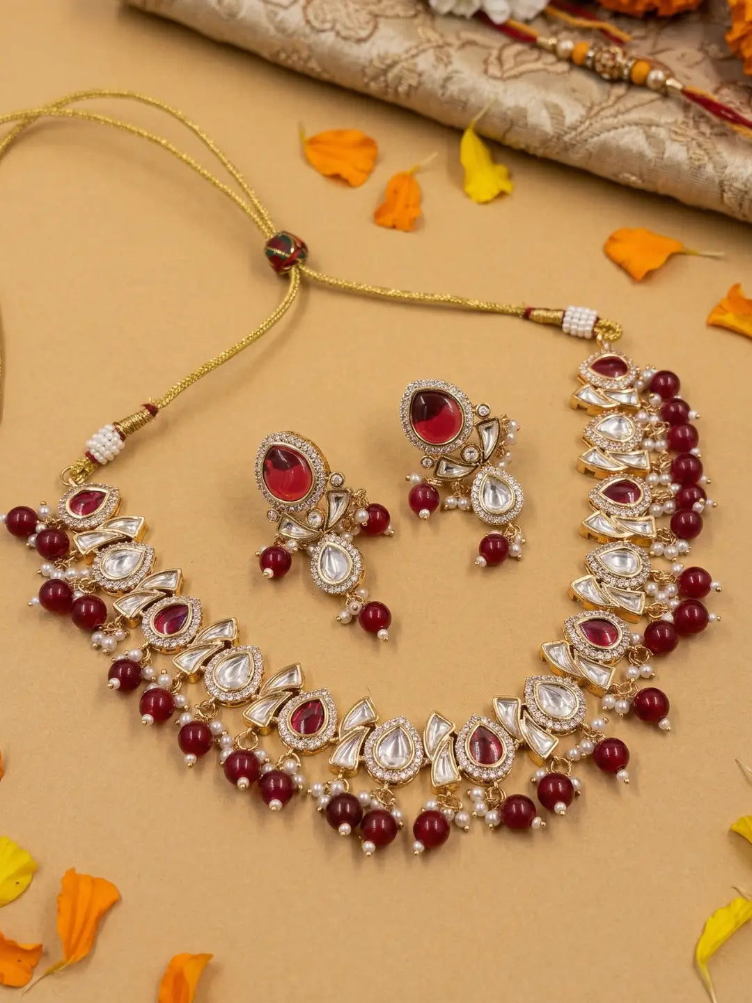 Elegant Beaded Kundan choker necklace set featuring handcrafted Ruby And Kundan stones, delicate pearl drops, and matching earrings, perfect for bridal wear, weddings, festive occasions, and traditional Indian jewellery.