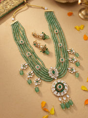 Handcrafted emerald green multi-layer beaded long necklace featuring an elegant Kundan pendant with matching earrings, perfect for bridal wear, weddings, festive celebrations, and traditional Indian jewellery.