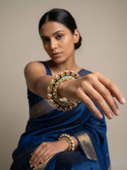 women wearing a Gold Plated Green Meenakari Kundan Pearls Pacheli Kada Bangles For Women | Wedding & Bridal Wear