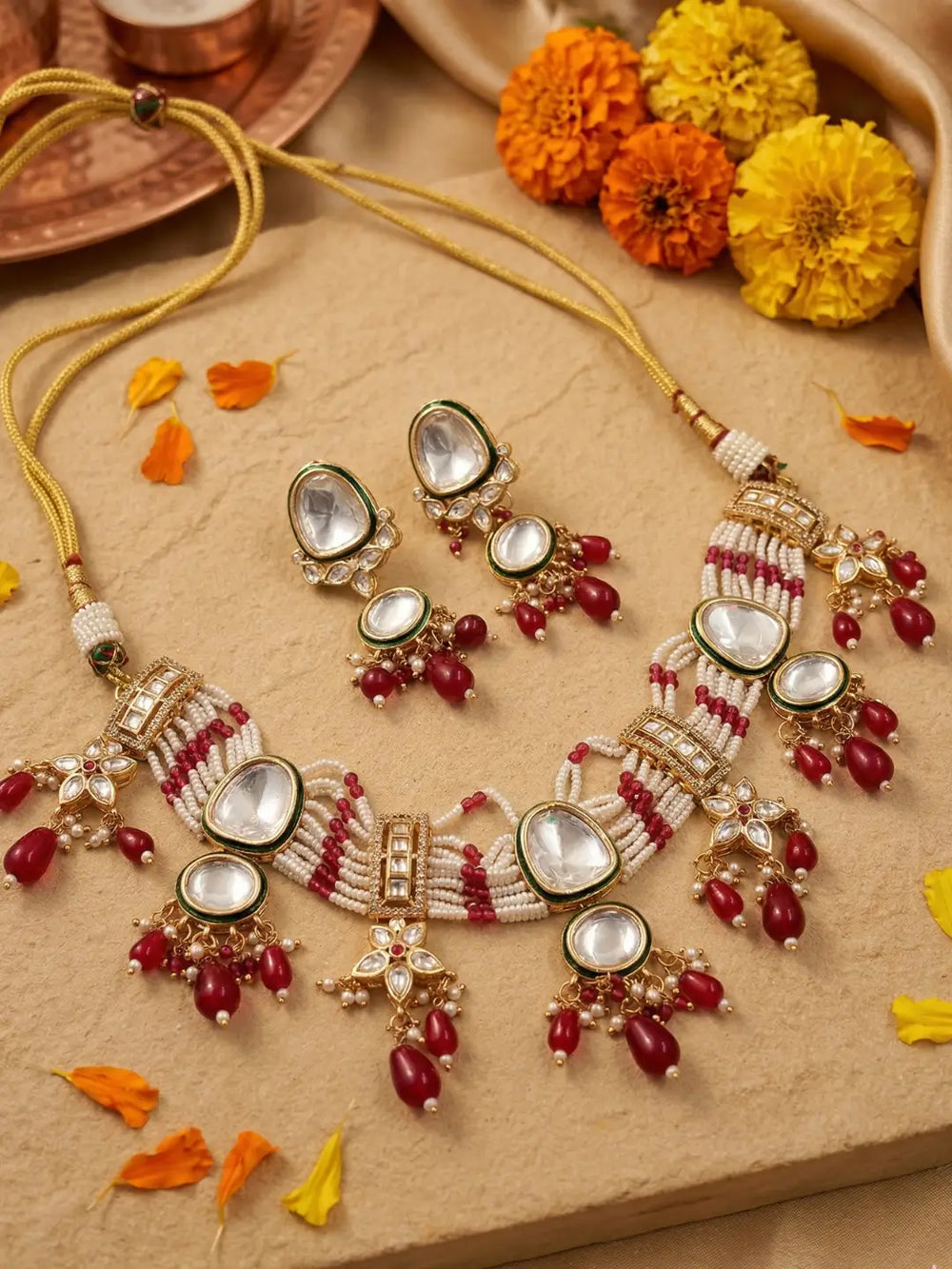 Handcrafted multi-strand Kundan Pearl choker necklace set with matching earrings featuring ruby red bead accents, perfect for bridal wear, weddings, festive occasions, and traditional Indian jewellery.