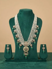  Elegant multi-layer pearl long necklace set featuring a handcrafted Kundan pendant with emerald green bead drops, ruby-inspired centre stone, and matching earrings, perfect for bridal wear, weddings, festive occasions, and traditional Indian jewellery.