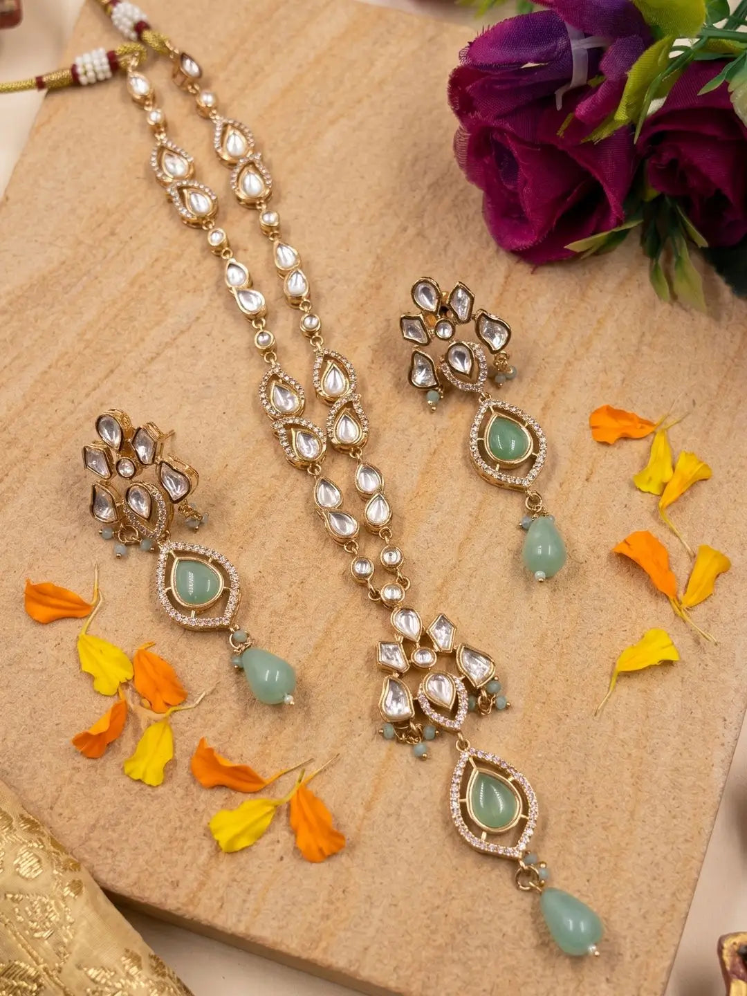 Elegant gold-plated Kundan pendant necklace set with polki and mint green drop pendant and matching earrings, handcrafted traditional Indian jewellery for weddings, festive occasions, party wear, and ethnic outfits.