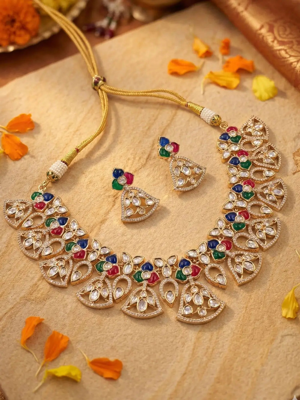 handcrafted gold-plated floral Kundan necklace set with matching earrings featuring Polki, CZ stones and  mulri colour enamel accents, ideal for bridal wear, weddings, festive occasions, and traditional Indian jewellery.