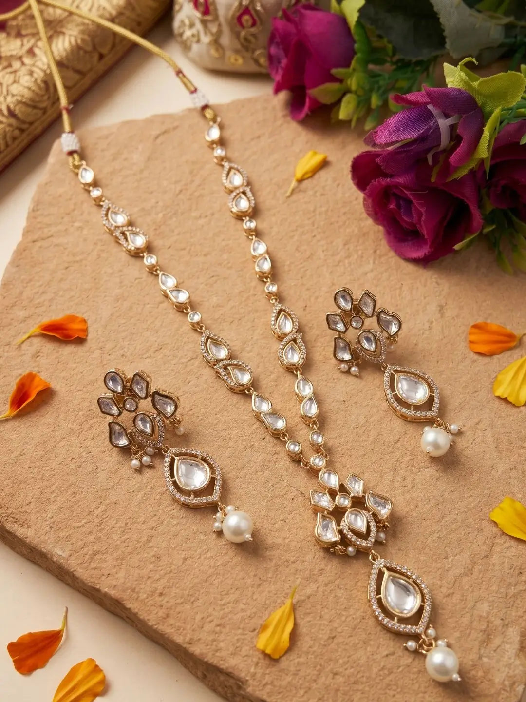 Elegant gold-plated Kundan pendant necklace set with polki drop pendant and matching earrings, handcrafted traditional Indian jewellery for weddings, festive occasions, party wear, and ethnic outfits.